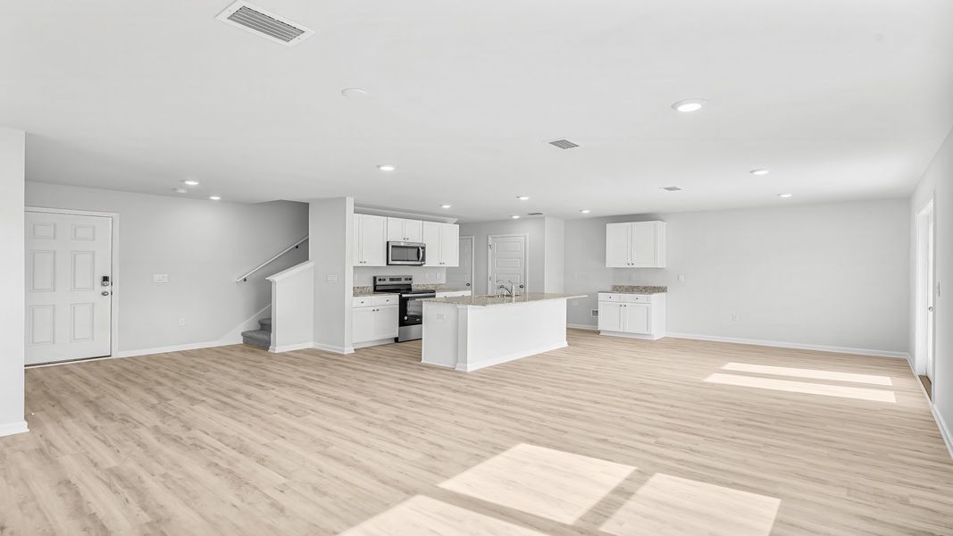 Representative unfurnished interior of a home built from the The Aisle by D.R. Horton in Titus Park, Panama City (Image 25).