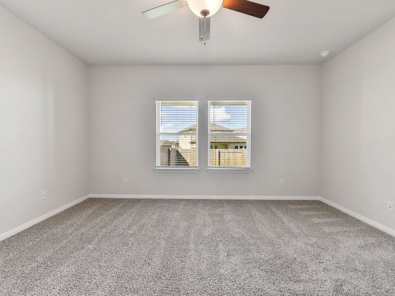 Get plenty of natural lighting in the primary bedroom.