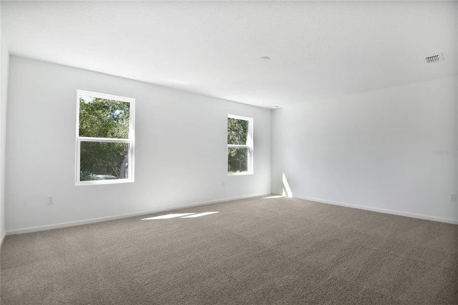 Spacious, unfurnished interior of a new home in Seasons at Shores of Lake Dell, Dundee (Image 11).