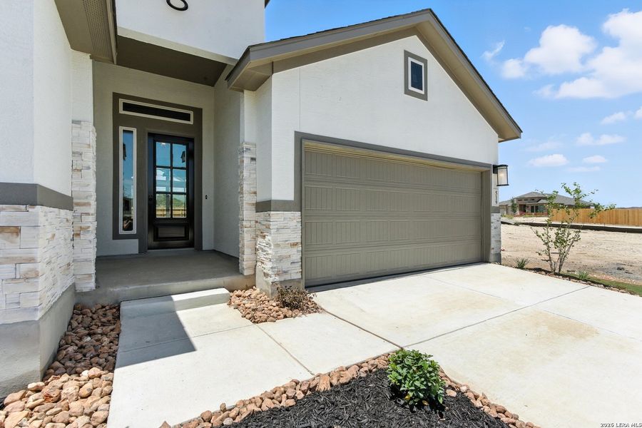 Exterior details and patio area of a home in Alsatian Oaks, Castroville (Image 3).