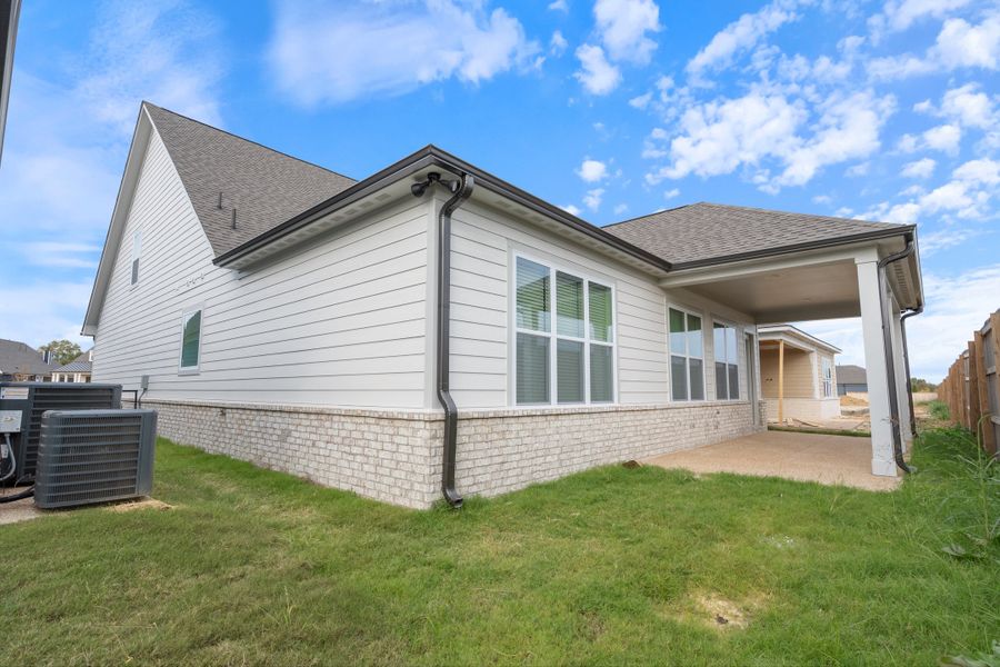 Exterior details and patio area of a home in Myers Park, Arlington (Image 3).