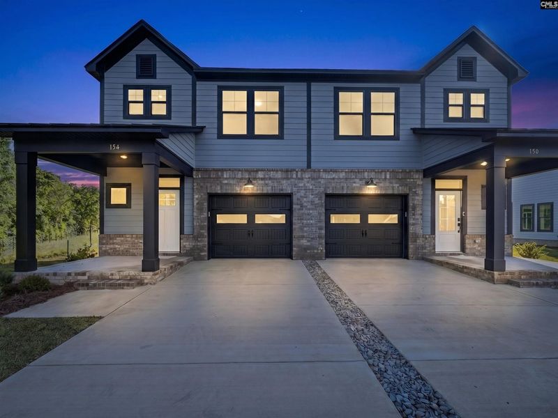 Front exterior of a new home in Dunbar Village, Cayce, SC, highlighting curb appeal (Image 21).