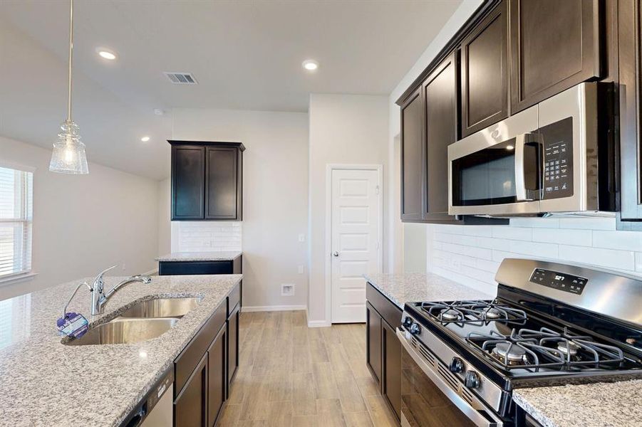 Furnished interior view inside a new home in Mobberly Farms, Pilot Point (Image 8).