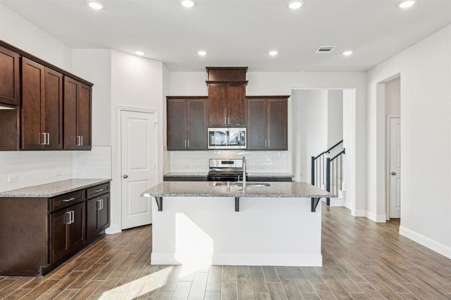 Furnished interior view inside a new home in AnaCapri, Anna (Image 10). Furnished interior view inside a new home in AnaCapri, Anna (Image 10).