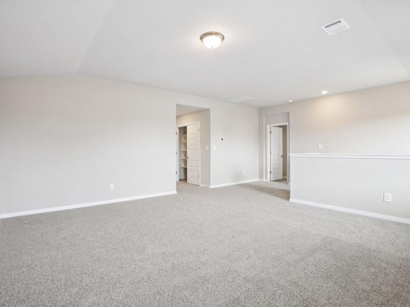 Unfurnished room with light colored carpet, baseboards, and recessed lighting Unfurnished room with light colored carpet, baseboards, and recessed lighting