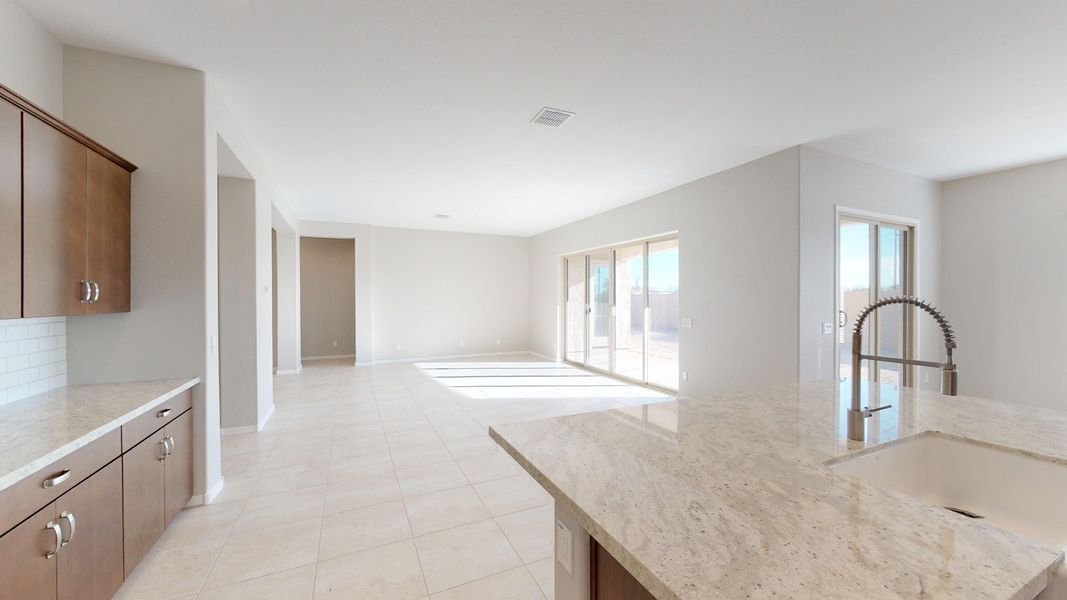 Representative furnished interior of a home built from the Benissa by DRB Homes in Windrose, Waddell (Image 6).