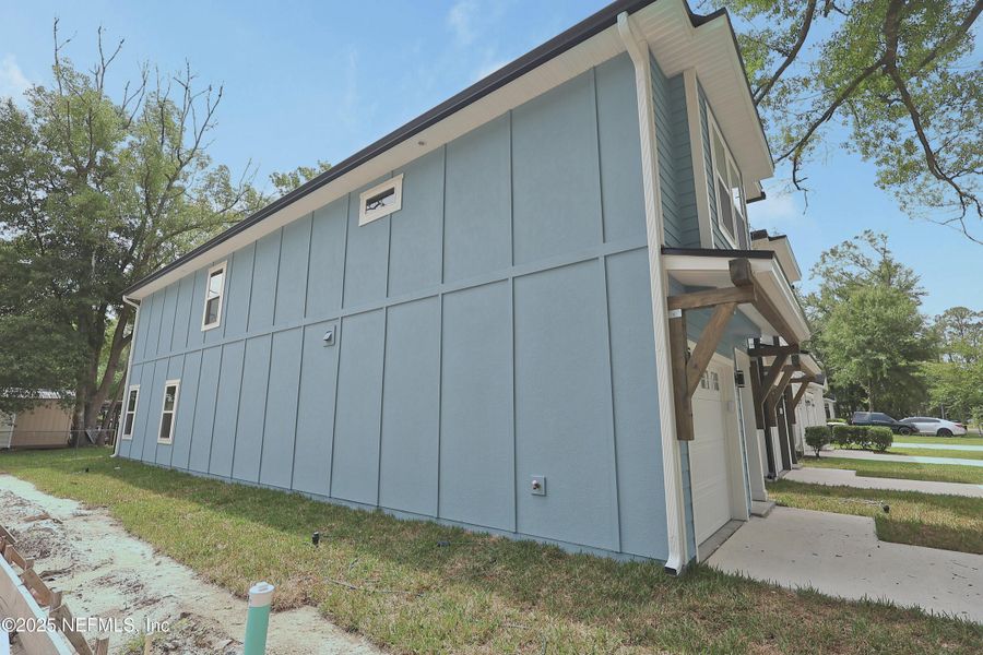Front exterior of a new home in , Jacksonville, FL, highlighting curb appeal (Image 30). Front exterior of a new home in , Jacksonville, FL, highlighting curb appeal (Image 30).