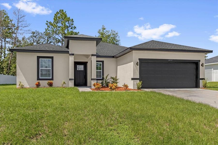 Front exterior of a new home in , Ocala, FL, highlighting curb appeal (Image 21).