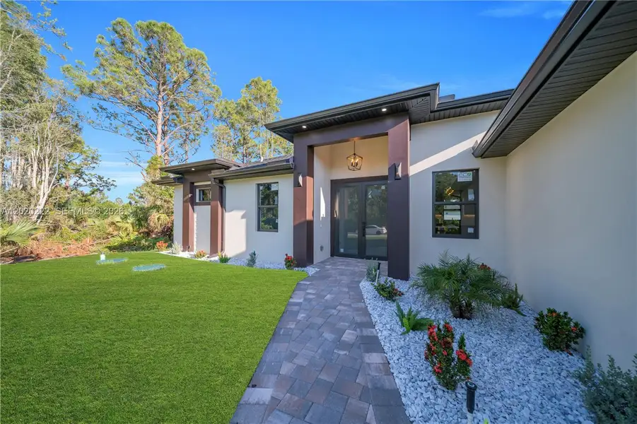 Exterior details and patio area of a home in , Lehigh Acres (Image 29).