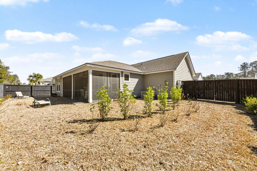 Exterior details and patio area of a home in , Johns Island (Image 27).