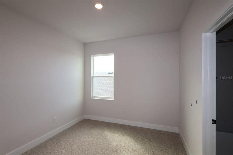 Spacious, unfurnished interior of a new home in Waterset Tradition Series, Apollo Beach (Image 34).