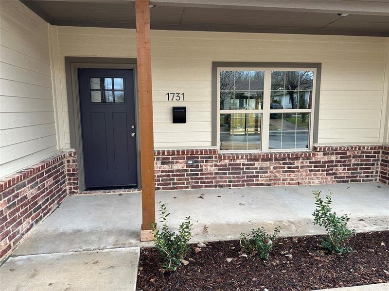 Covered porch welcomes you into this energy efficient Home.