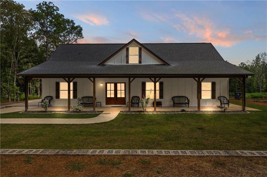 Front exterior of a new home in , Carrollton, GA, highlighting curb appeal (Image 1).