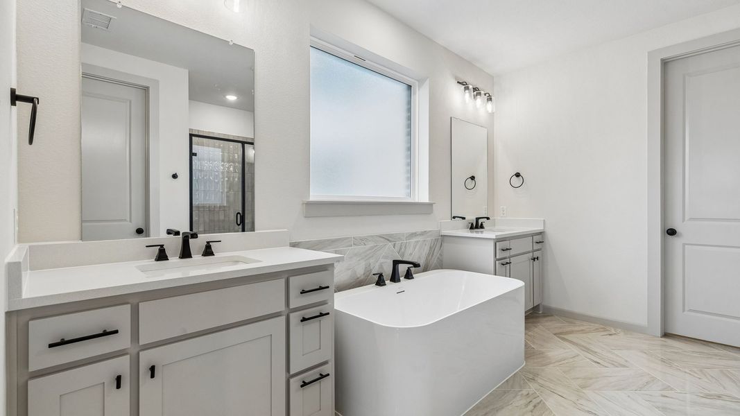Representative furnished interior of a home built from the Toulouse II by Normandy Homes in Rainwater Crossing, Celina (Image 8).