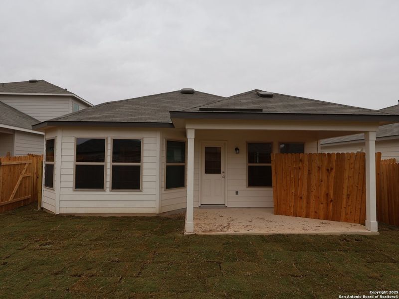 Exterior details and patio area of a home in Winding Brook, San Antonio (Image 19).