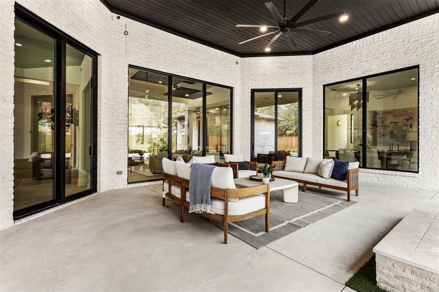 The patio connects seamlessly to the pool and backyard, making indoor and outdoor living feel naturally connected