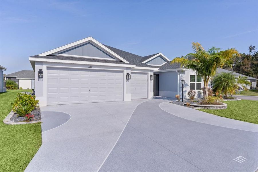 Front exterior of a new home in , The Villages, FL, highlighting curb appeal (Image 28). Front exterior of a new home in , The Villages, FL, highlighting curb appeal (Image 28).