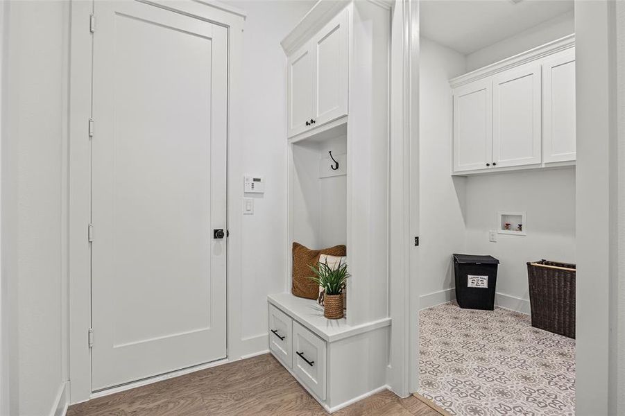 Mudroom featuring hardwood / wood-style floors