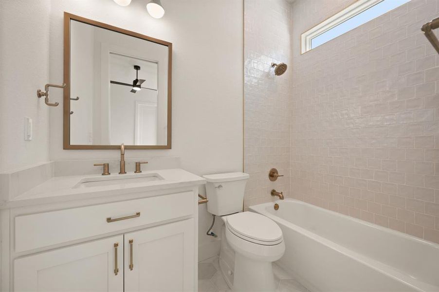 Bathroom featuring vanity and shower combination Bathroom featuring vanity and shower combination