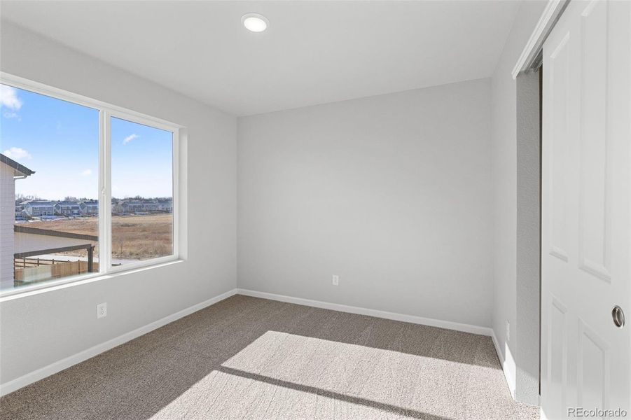 Spacious, unfurnished interior of a new home in Highlands Preserve, Mead (Image 21).