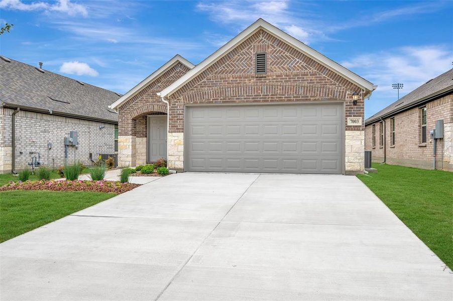 Front exterior of a new home in Lane Ranch, Sanger, TX, highlighting curb appeal (Image 22).