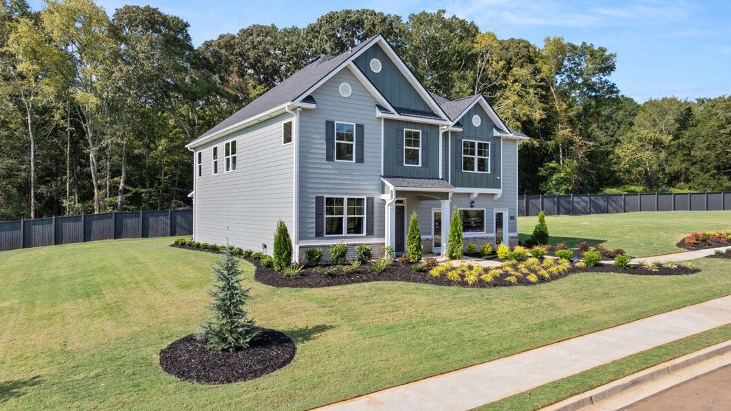 Representative exterior photo of a completed home built from the Halton by D.R. Horton in Jackson Landing, Jefferson, GA (Image 2).