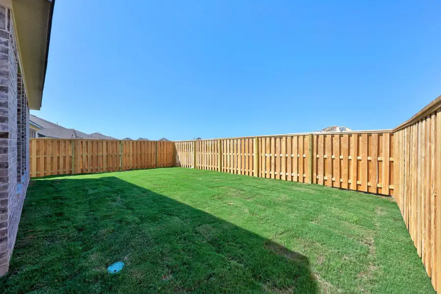 Exterior details and patio area of a home in Parmer Ranch - 40', Georgetown (Image 4).