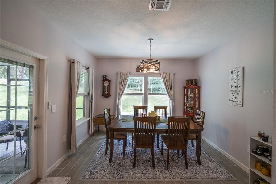 Furnished interior view inside a new home in Grand Park North, Dunnellon (Image 11).