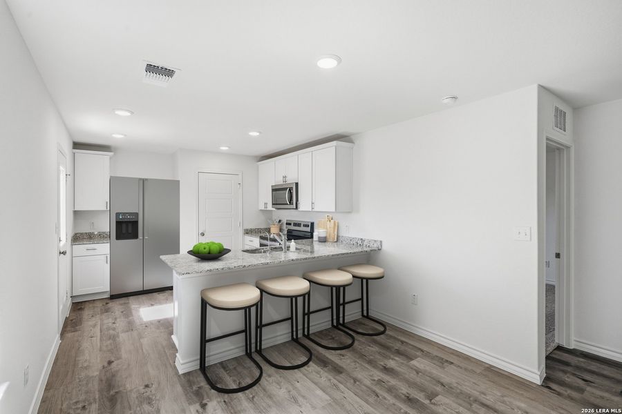 Furnished interior view inside a new home in Vista Real, Converse (Image 15).