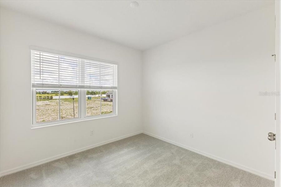 Spacious, unfurnished interior of a new home in The Residences at Emerson Park, Apopka (Image 12).