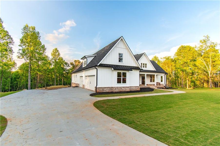 Front exterior of a new home in , Fairmount, GA, highlighting curb appeal (Image 13).