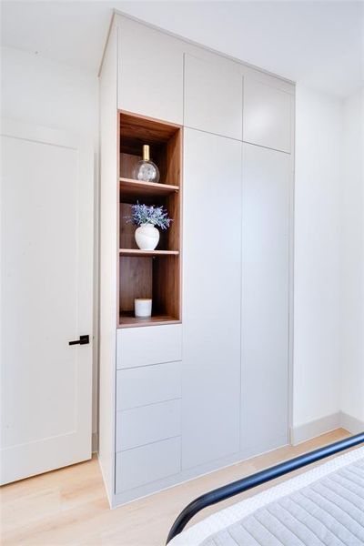 Unfurnished bedroom featuring light wood-type flooring