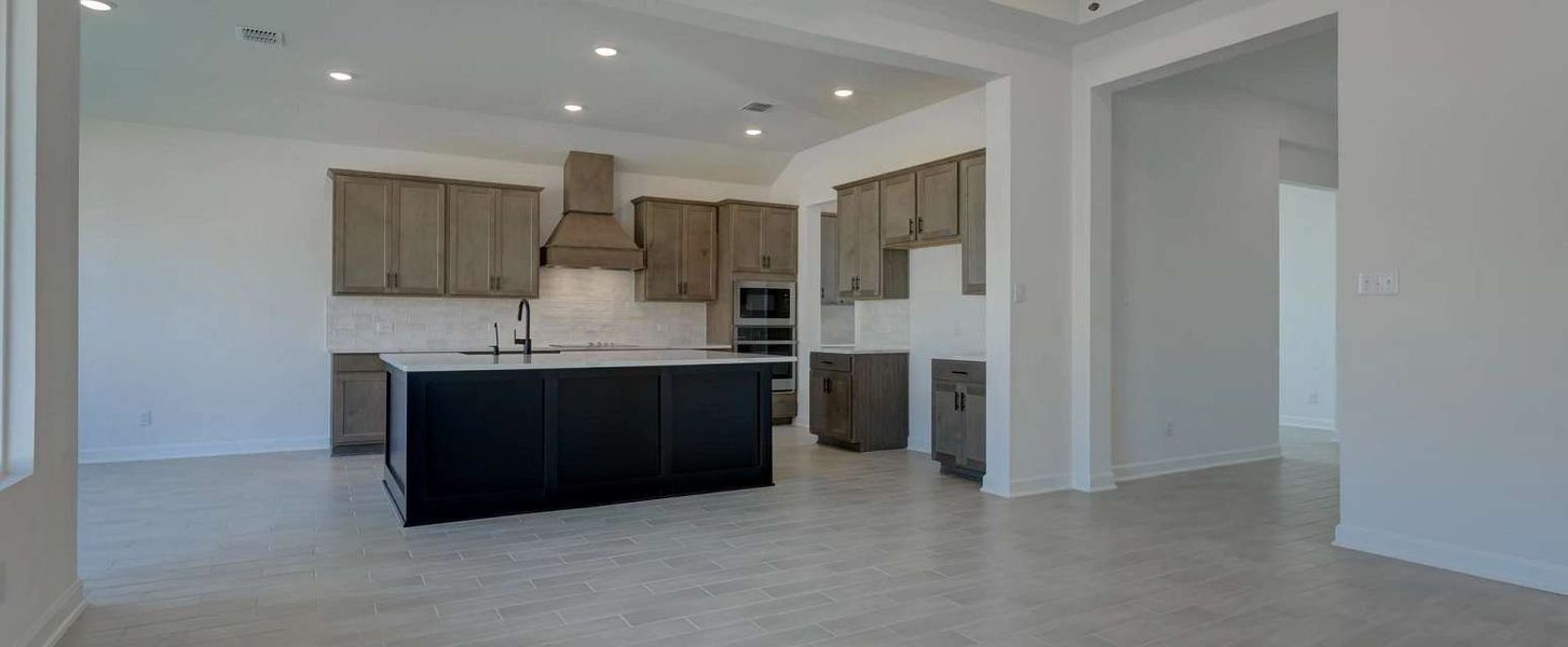 Representative furnished interior of a home built from the Kerrville by Ashton Woods in Saddlebrook Ranch, Schertz (Image 6). Representative furnished interior of a home built from the Kerrville by Ashton Woods in Saddlebrook Ranch, Schertz (Image 6).