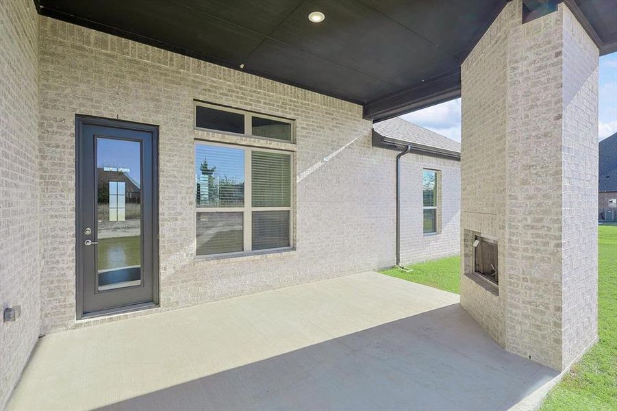 Front exterior of a new home in Oak Creek Ranch, Midlothian, TX, highlighting curb appeal (Image 24).