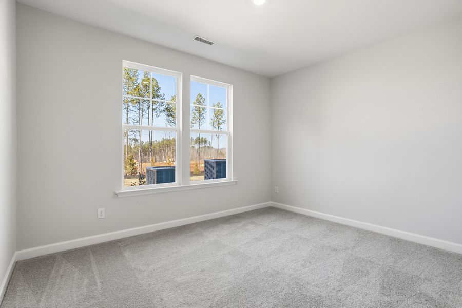 Spacious, unfurnished interior of a new home in Sweetbrier, Durham (Image 33).