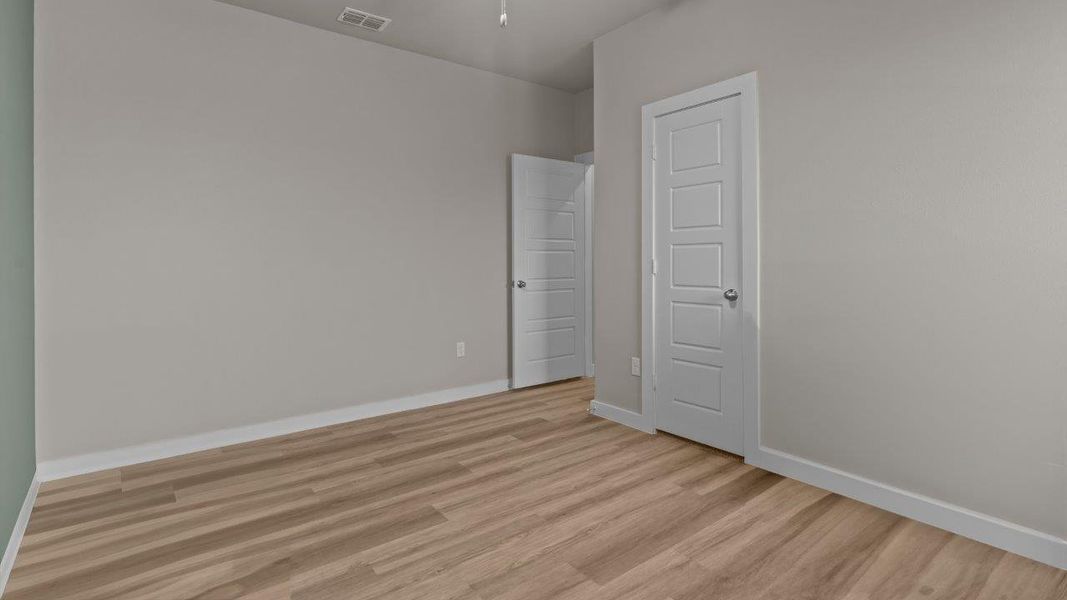 Representative unfurnished interior of a home built from the Portales by D.R. Horton in Heritage Parks, Abilene (Image 22).