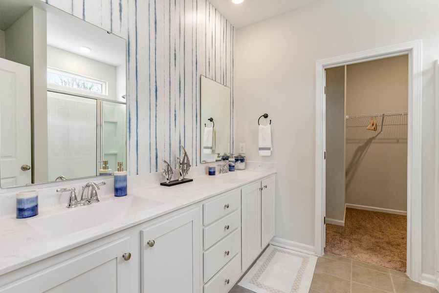 Representative furnished interior of a home built from the WREN by D.R. Horton in Kingston Bay, Conway (Image 18).