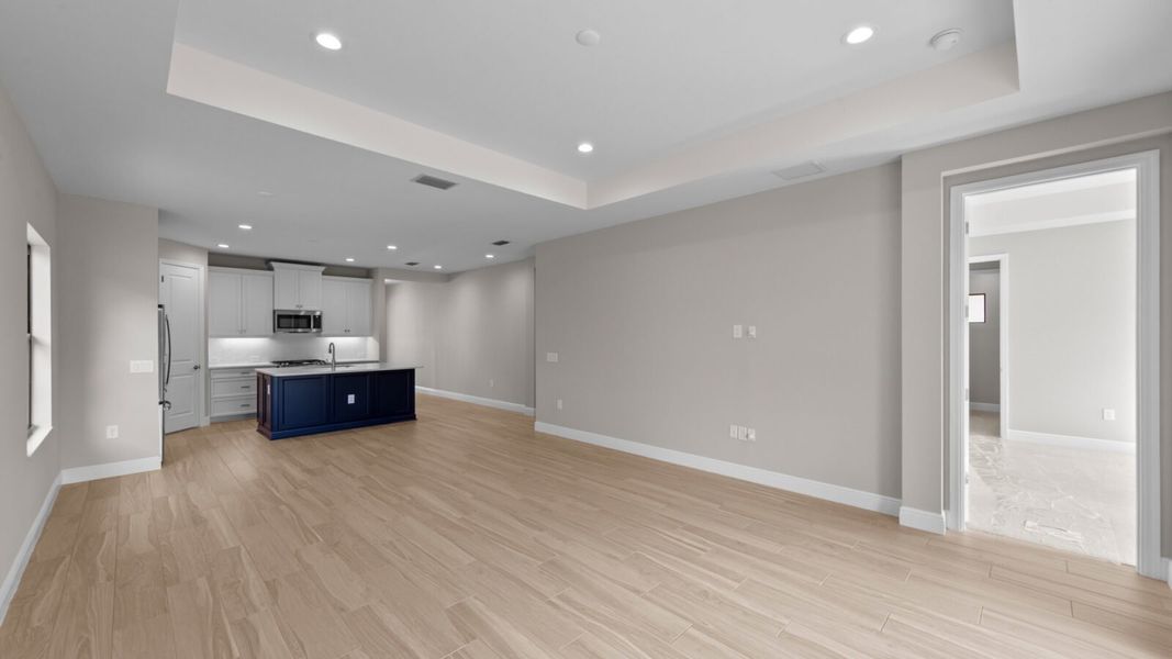 Spacious, unfurnished interior of a new home in SkySail, Naples (Image 14).