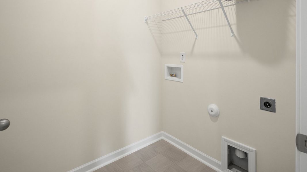 Spacious, unfurnished interior of a new home in The Grove at Matthews Landing, Fuquay Varina (Image 18).