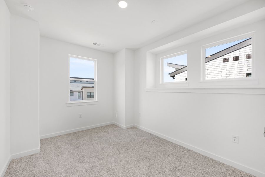 Spacious, unfurnished interior of a new home in Willow Grove Townhomes, Melissa (Image 23).