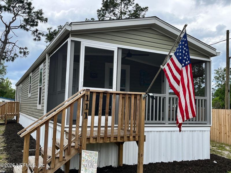 Exterior details and patio area of a home in , Satsuma (Image 23).