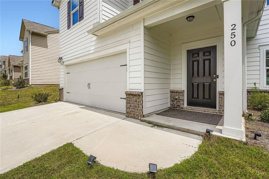 Front exterior of a new home in , Villa Rica, GA, highlighting curb appeal (Image 20). Front exterior of a new home in , Villa Rica, GA, highlighting curb appeal (Image 20).