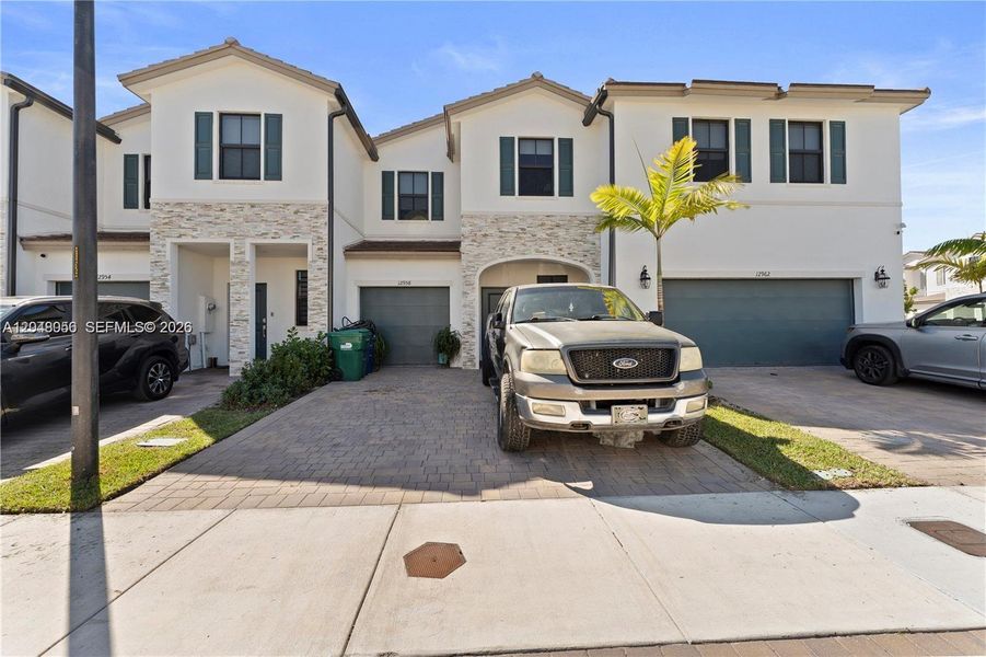 Front exterior of a new home in , Miami, FL, highlighting curb appeal (Image 2). Front exterior of a new home in , Miami, FL, highlighting curb appeal (Image 2).