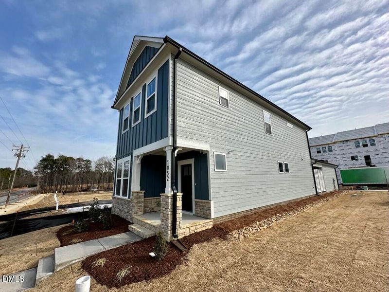 Exterior details and patio area of a home in Forestville Yard, Knightdale (Image 15).