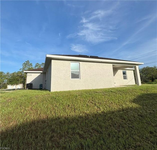 Exterior details and patio area of a home in , Lehigh Acres (Image 4).