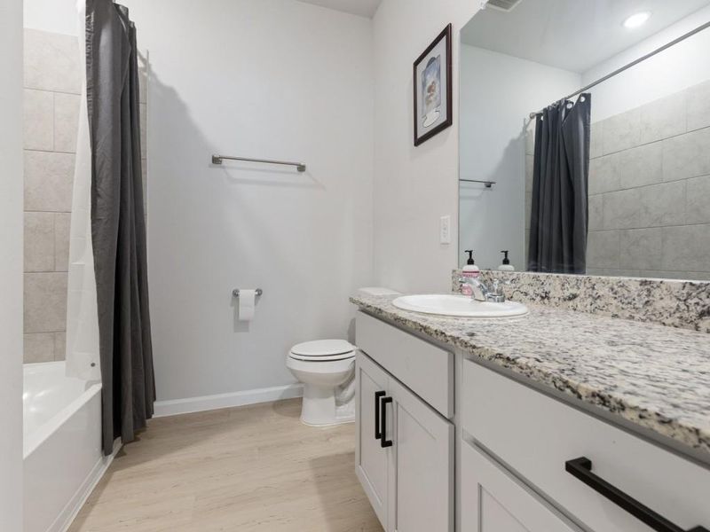 Furnished interior view inside a new home in , Conroe (Image 18).