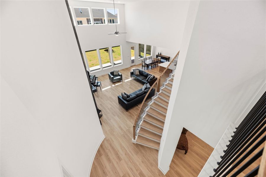 Furnished interior view inside a new home in Bridgeland, Cypress (Image 28).