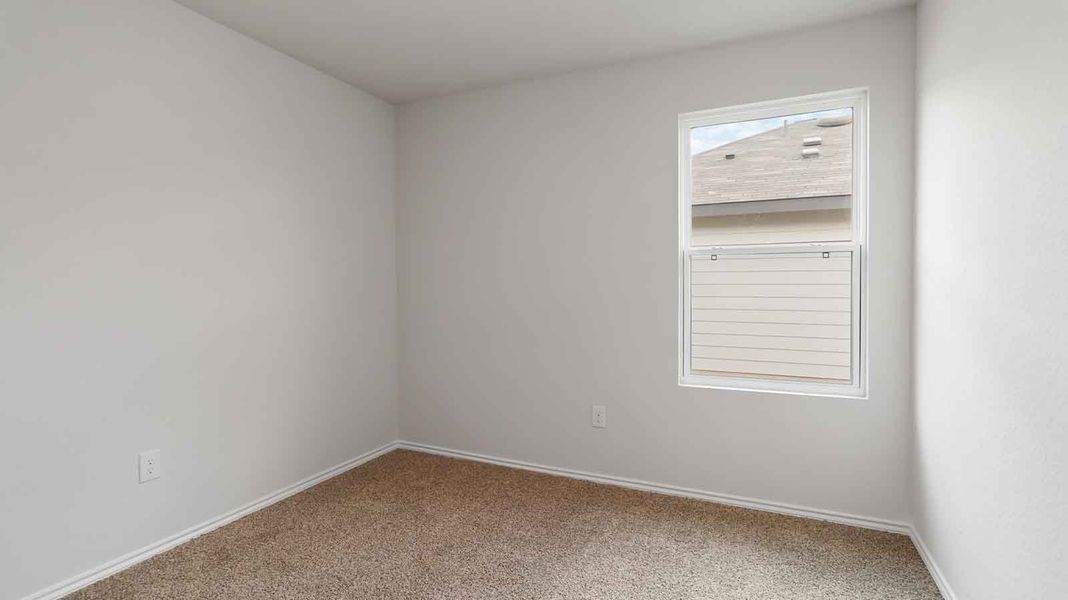 Representative unfurnished interior of a home built from the Atlanta by D.R. Horton in Watermark, Alvin (Image 15).