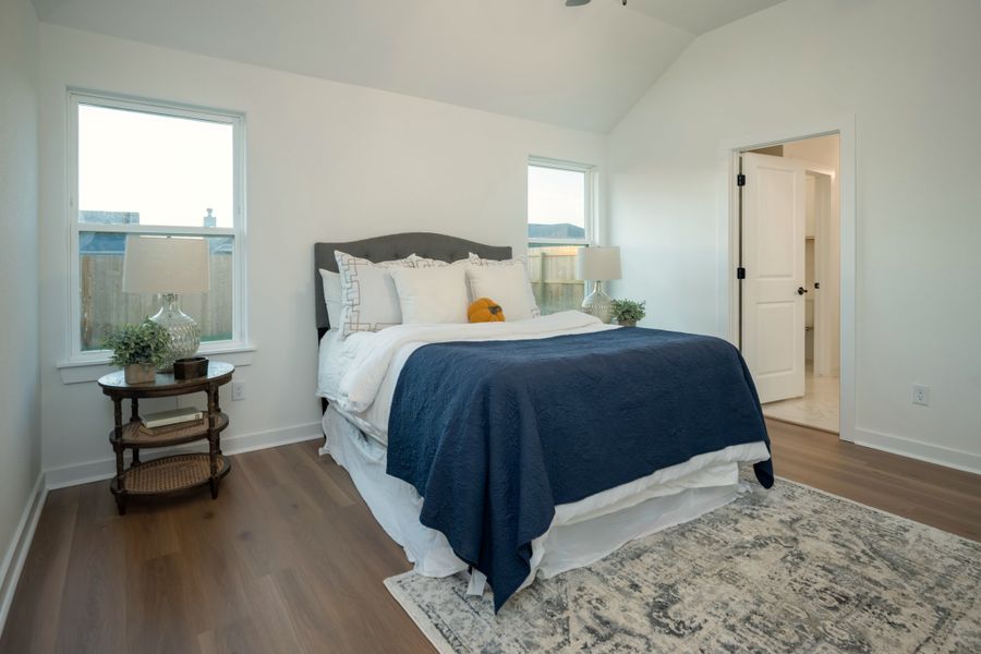 Representative furnished interior of a home built from the The Rose by Avonley Homes in Pinemont, Bryan (Image 14).