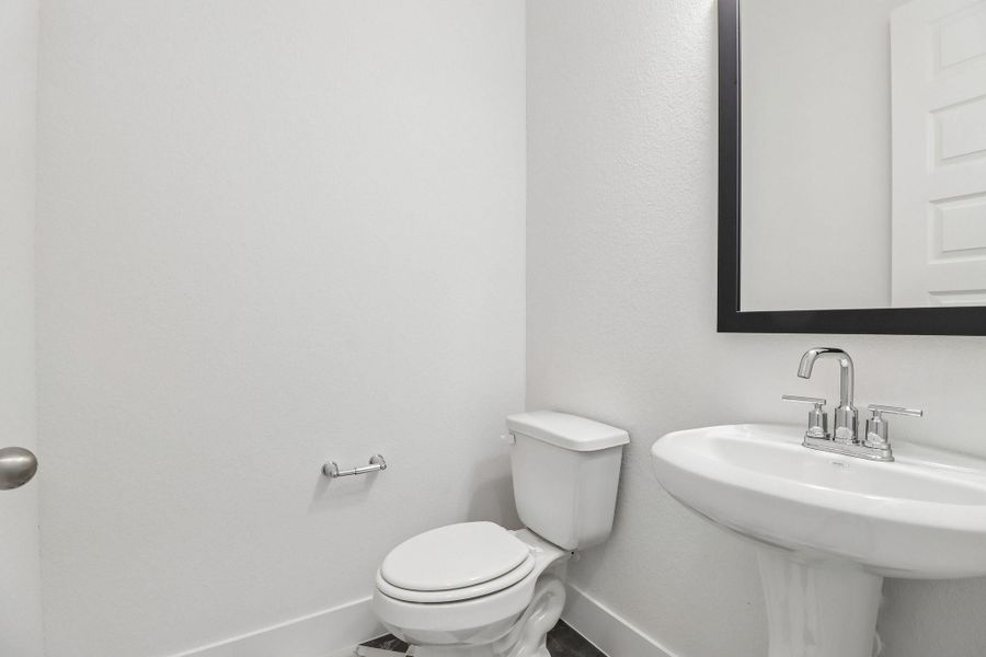 Furnished interior view inside a new home in The Grand Prairie 60', Hockley (Image 7).